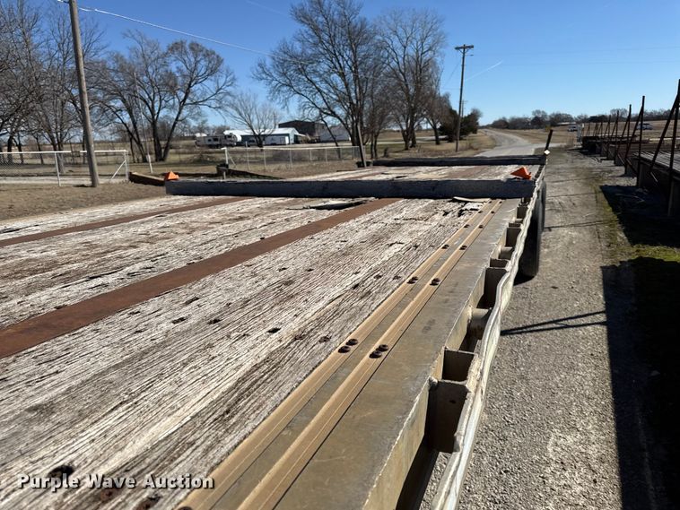 image for item EN0305 1999 Fontaine IPTW-6-8048WSAK flatbed trailer