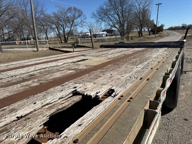 image for item EN0305 1999 Fontaine IPTW-6-8048WSAK flatbed trailer