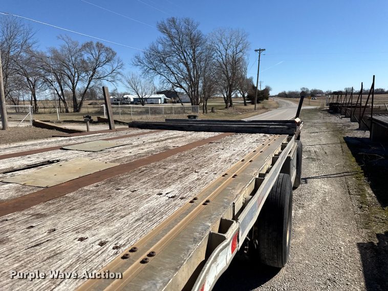 image for item EN0305 1999 Fontaine IPTW-6-8048WSAK flatbed trailer