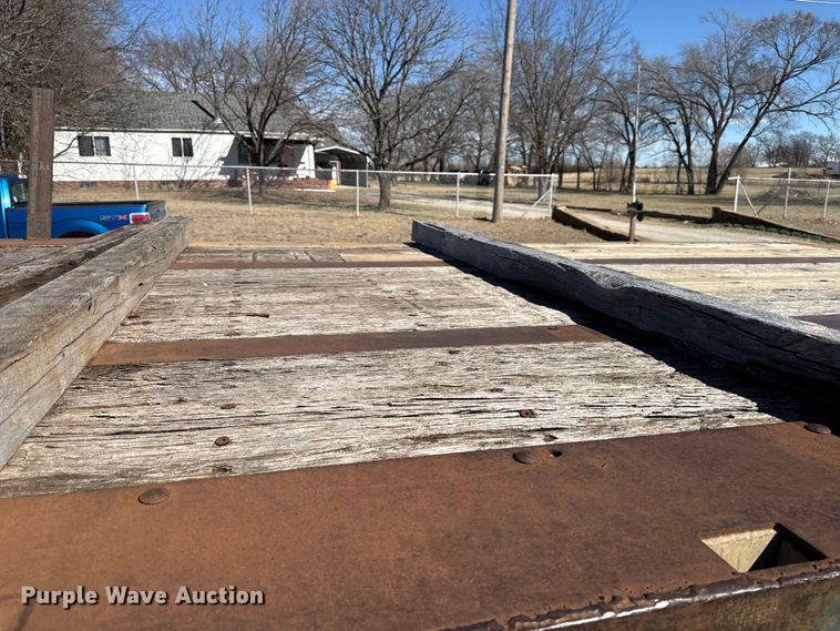 image for item EN0305 1999 Fontaine IPTW-6-8048WSAK flatbed trailer