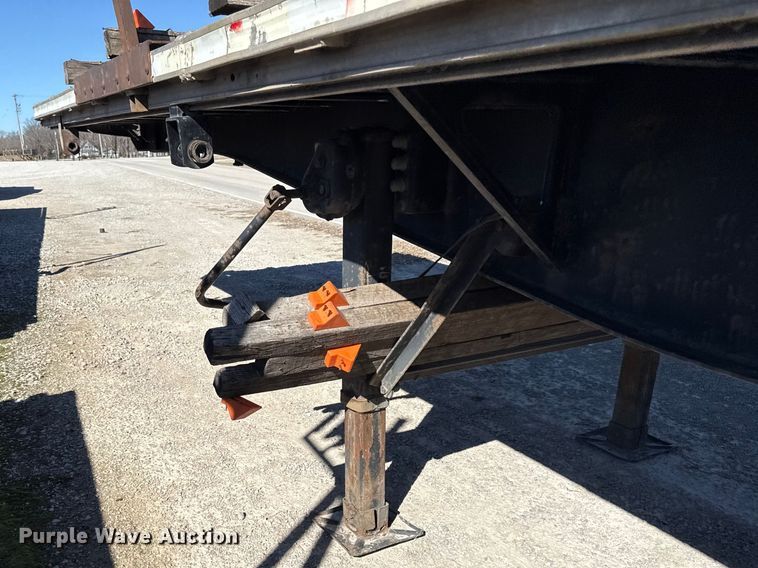 image for item EN0305 1999 Fontaine IPTW-6-8048WSAK flatbed trailer