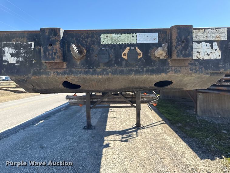 image for item EN0305 1999 Fontaine IPTW-6-8048WSAK flatbed trailer