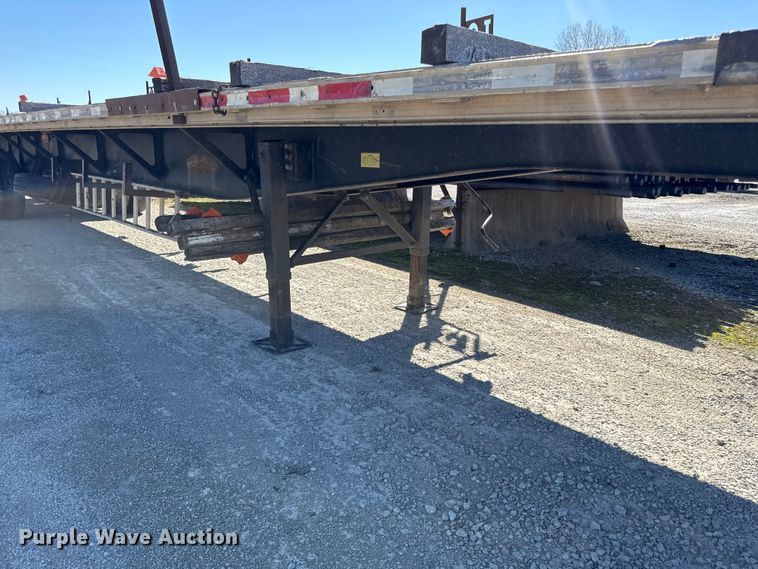image for item EN0305 1999 Fontaine IPTW-6-8048WSAK flatbed trailer