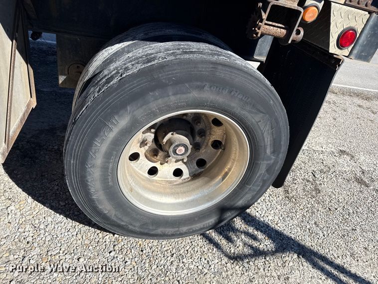 image for item EN0305 1999 Fontaine IPTW-6-8048WSAK flatbed trailer