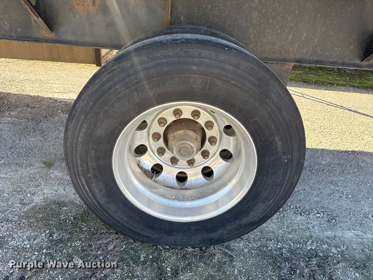 image for item EN0305 1999 Fontaine IPTW-6-8048WSAK flatbed trailer