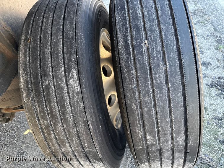 image for item EN0305 1999 Fontaine IPTW-6-8048WSAK flatbed trailer