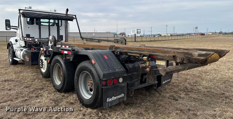 image for item ES5834 2019 Kenworth T880 roll-off container truck