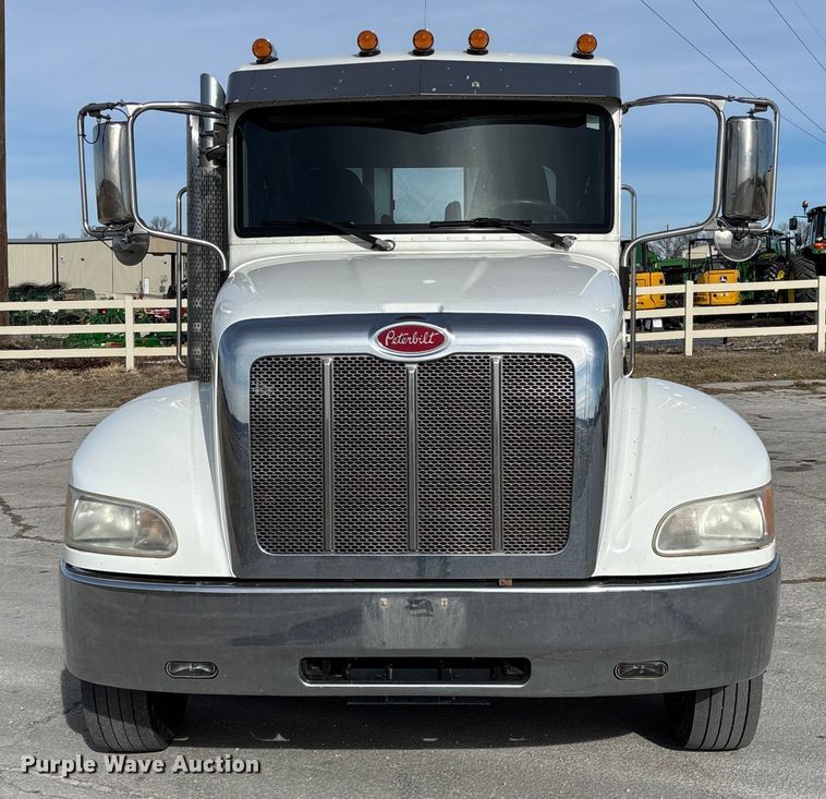 image for item FB3008 2015 Peterbilt 330 rollback truck