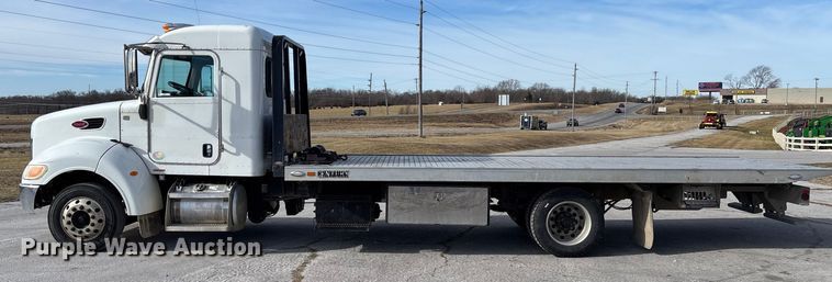 image for item FB3008 2015 Peterbilt 330 rollback truck