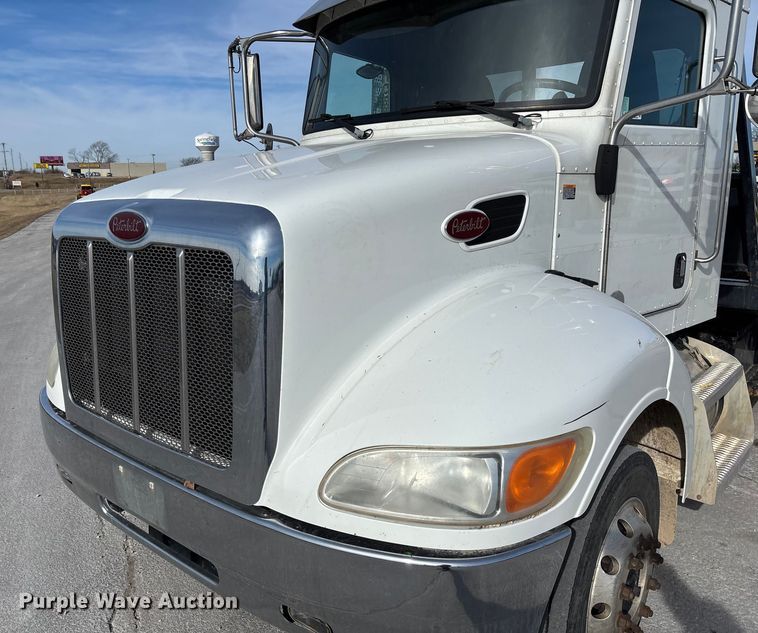 image for item FB3008 2015 Peterbilt 330 rollback truck
