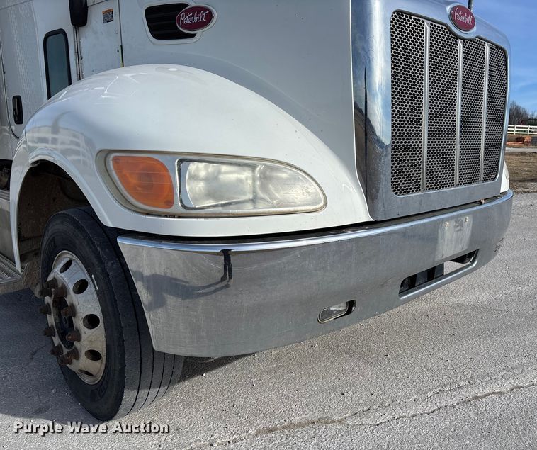 image for item FB3008 2015 Peterbilt 330 rollback truck