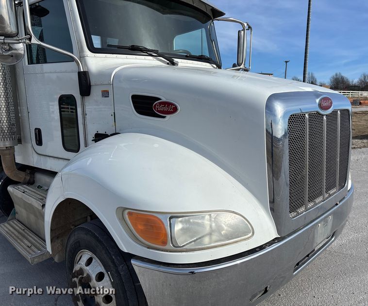 image for item FB3008 2015 Peterbilt 330 rollback truck