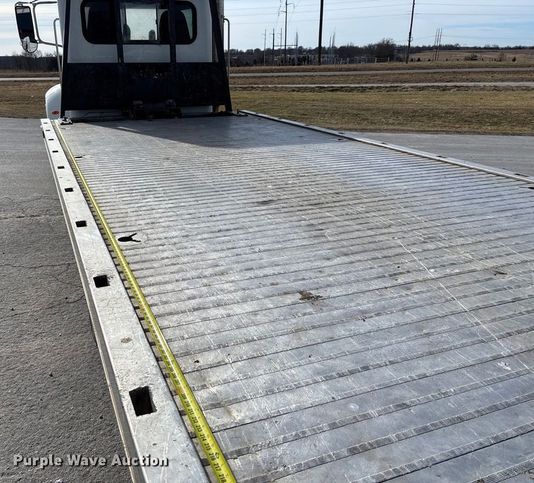 image for item FB3008 2015 Peterbilt 330 rollback truck