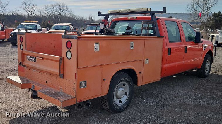 image for item DZ4303 2009 Ford F250 Super Duty Crew Cab utility bed pickup truck