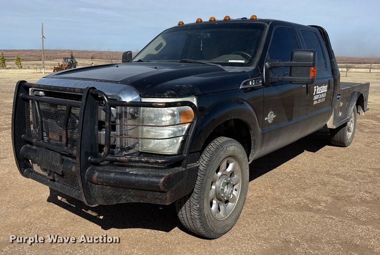 image for item DZ4990 2012 Ford F350 Super Duty Crew Cab flatbed pickup truck