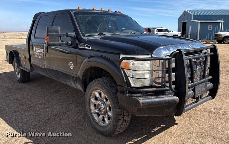 image for item DZ4990 2012 Ford F350 Super Duty Crew Cab flatbed pickup truck
