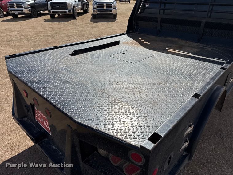 image for item DZ4990 2012 Ford F350 Super Duty Crew Cab flatbed pickup truck