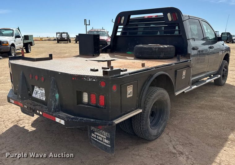 image for item DZ4991 2013 RAM 3500 Crew Cab flatbed pickup truck