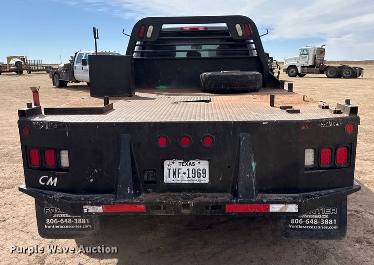 image for item DZ4991 2013 RAM 3500 Crew Cab flatbed pickup truck