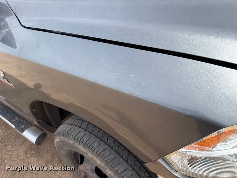 image for item DZ4991 2013 RAM 3500 Crew Cab flatbed pickup truck