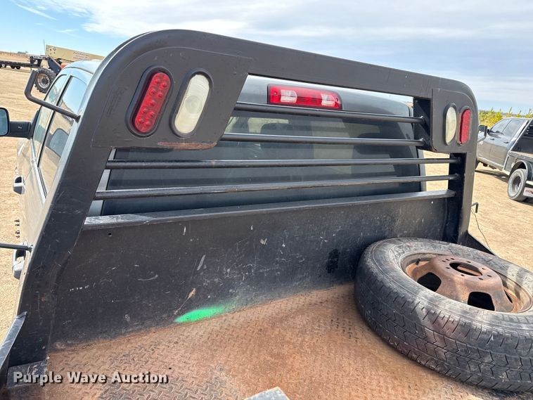 image for item DZ4991 2013 RAM 3500 Crew Cab flatbed pickup truck