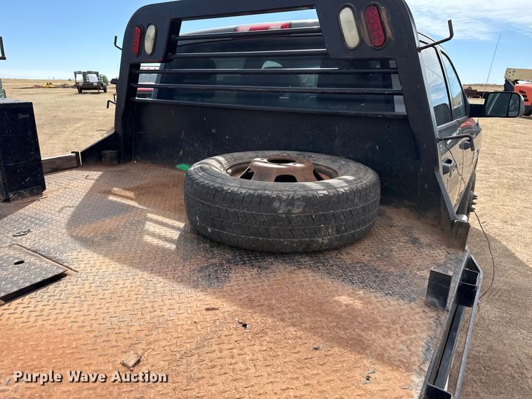 image for item DZ4991 2013 RAM 3500 Crew Cab flatbed pickup truck