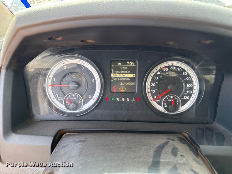 image for item DZ4991 2013 RAM 3500 Crew Cab flatbed pickup truck