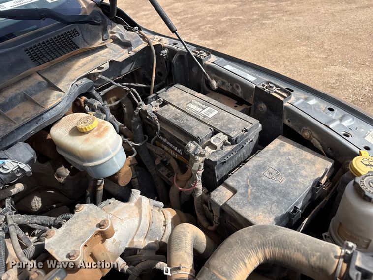 image for item DZ4991 2013 RAM 3500 Crew Cab flatbed pickup truck