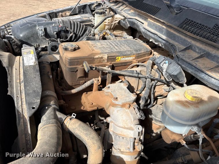 image for item DZ4991 2013 RAM 3500 Crew Cab flatbed pickup truck