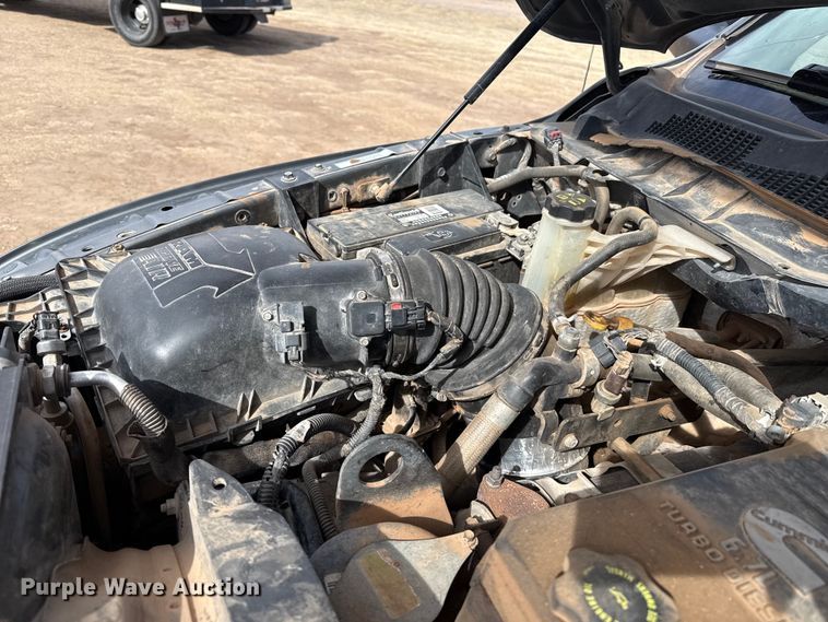 image for item DZ4991 2013 RAM 3500 Crew Cab flatbed pickup truck