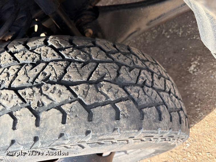 image for item DZ4991 2013 RAM 3500 Crew Cab flatbed pickup truck