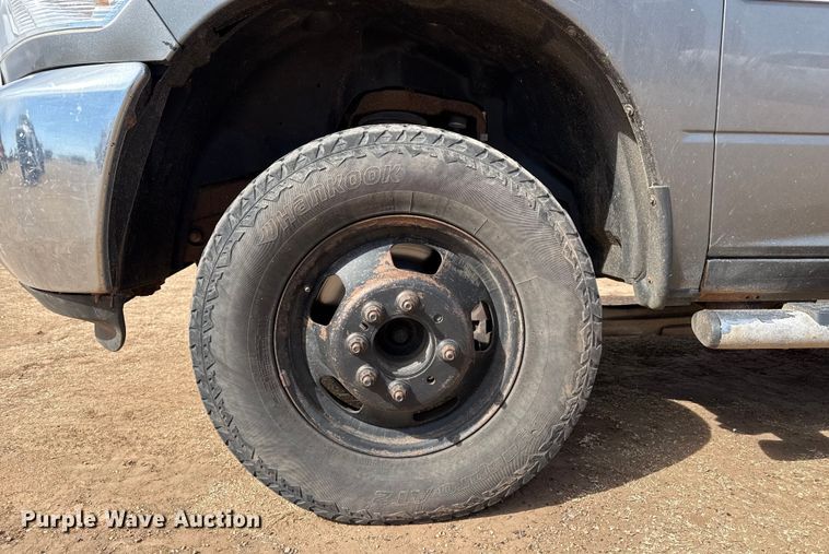 image for item DZ4991 2013 RAM 3500 Crew Cab flatbed pickup truck