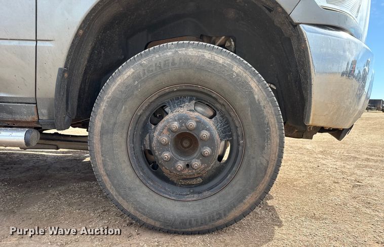 image for item DZ4991 2013 RAM 3500 Crew Cab flatbed pickup truck