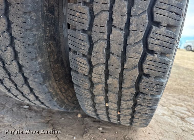 image for item DZ4991 2013 RAM 3500 Crew Cab flatbed pickup truck