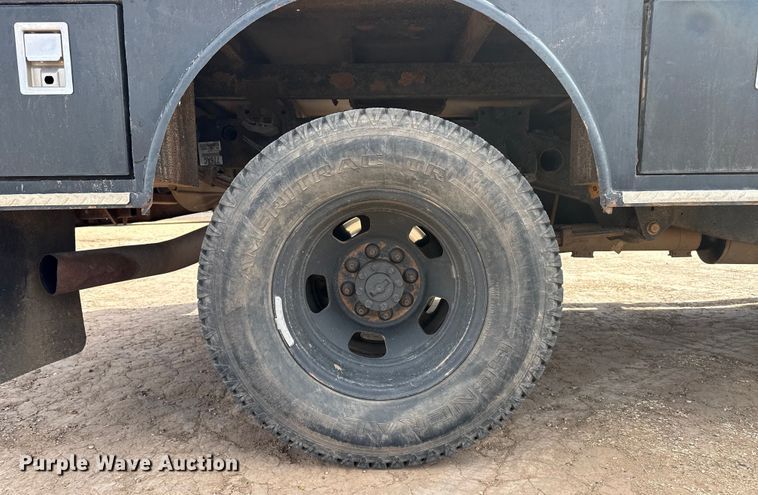 image for item DZ4991 2013 RAM 3500 Crew Cab flatbed pickup truck