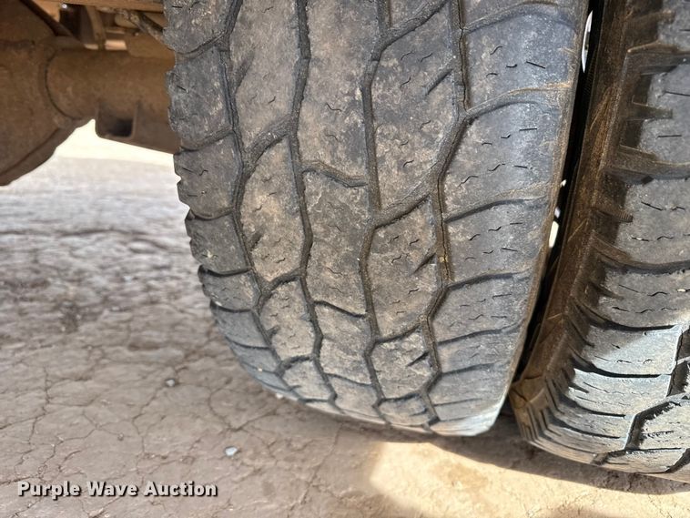 image for item DZ4991 2013 RAM 3500 Crew Cab flatbed pickup truck