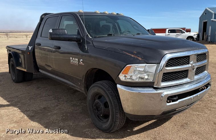 image for item DZ4992 2016 RAM 3500 Crew Cab flatbed pickup truck