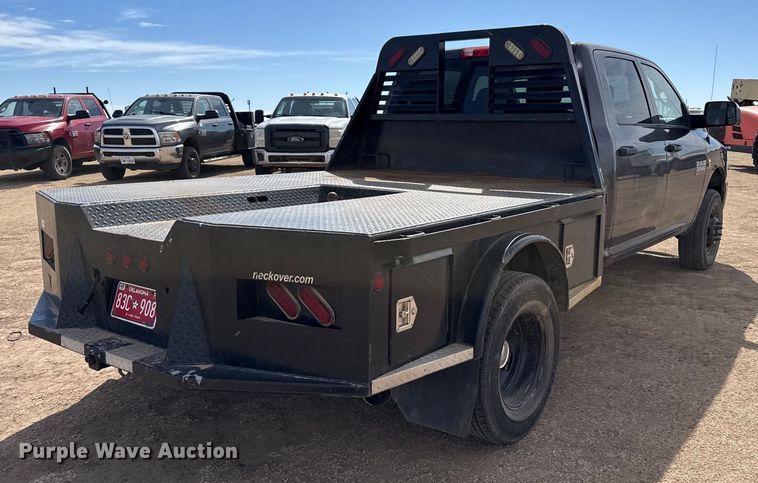image for item DZ4992 2016 RAM 3500 Crew Cab flatbed pickup truck