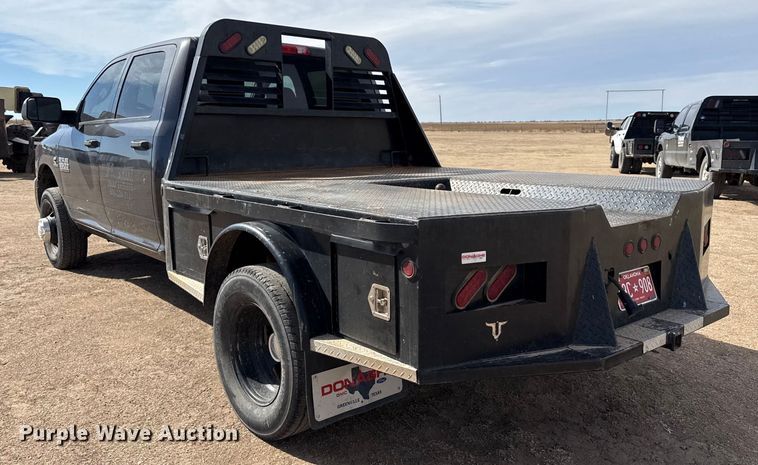 image for item DZ4992 2016 RAM 3500 Crew Cab flatbed pickup truck