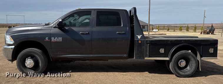 image for item DZ4992 2016 RAM 3500 Crew Cab flatbed pickup truck