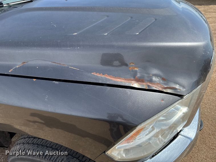 image for item DZ4992 2016 RAM 3500 Crew Cab flatbed pickup truck