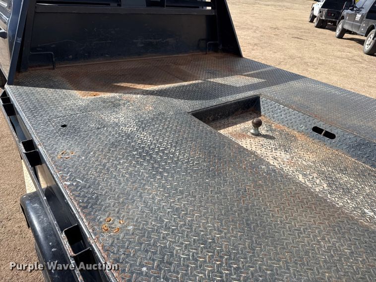 image for item DZ4992 2016 RAM 3500 Crew Cab flatbed pickup truck