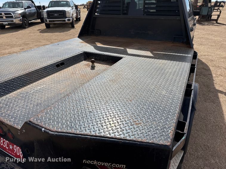 image for item DZ4992 2016 RAM 3500 Crew Cab flatbed pickup truck