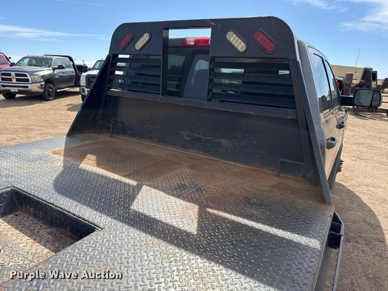 image for item DZ4992 2016 RAM 3500 Crew Cab flatbed pickup truck