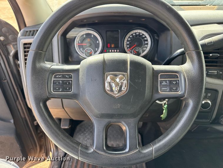 image for item DZ4992 2016 RAM 3500 Crew Cab flatbed pickup truck