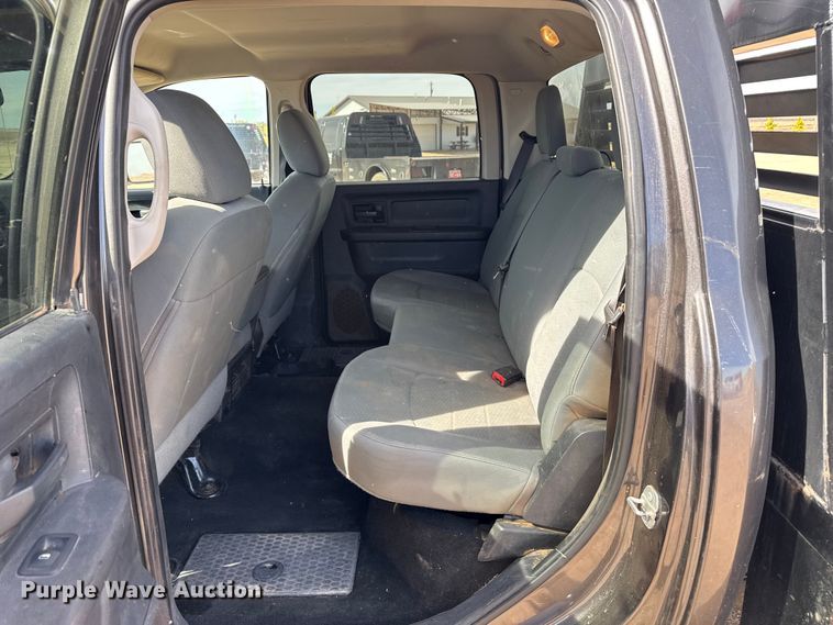 image for item DZ4992 2016 RAM 3500 Crew Cab flatbed pickup truck