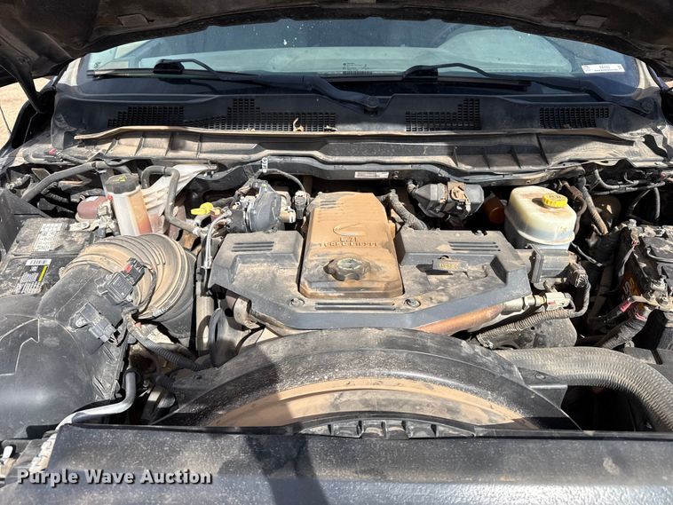 image for item DZ4992 2016 RAM 3500 Crew Cab flatbed pickup truck