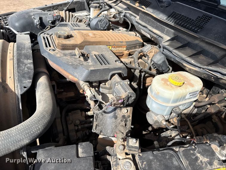 image for item DZ4992 2016 RAM 3500 Crew Cab flatbed pickup truck