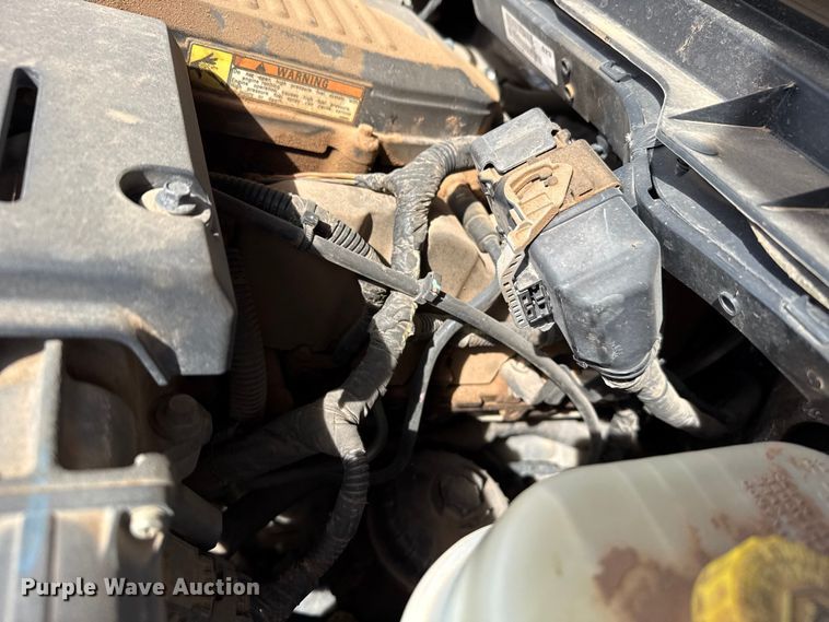 image for item DZ4992 2016 RAM 3500 Crew Cab flatbed pickup truck