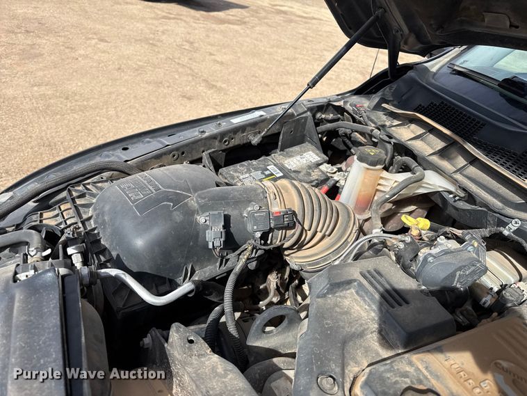 image for item DZ4992 2016 RAM 3500 Crew Cab flatbed pickup truck